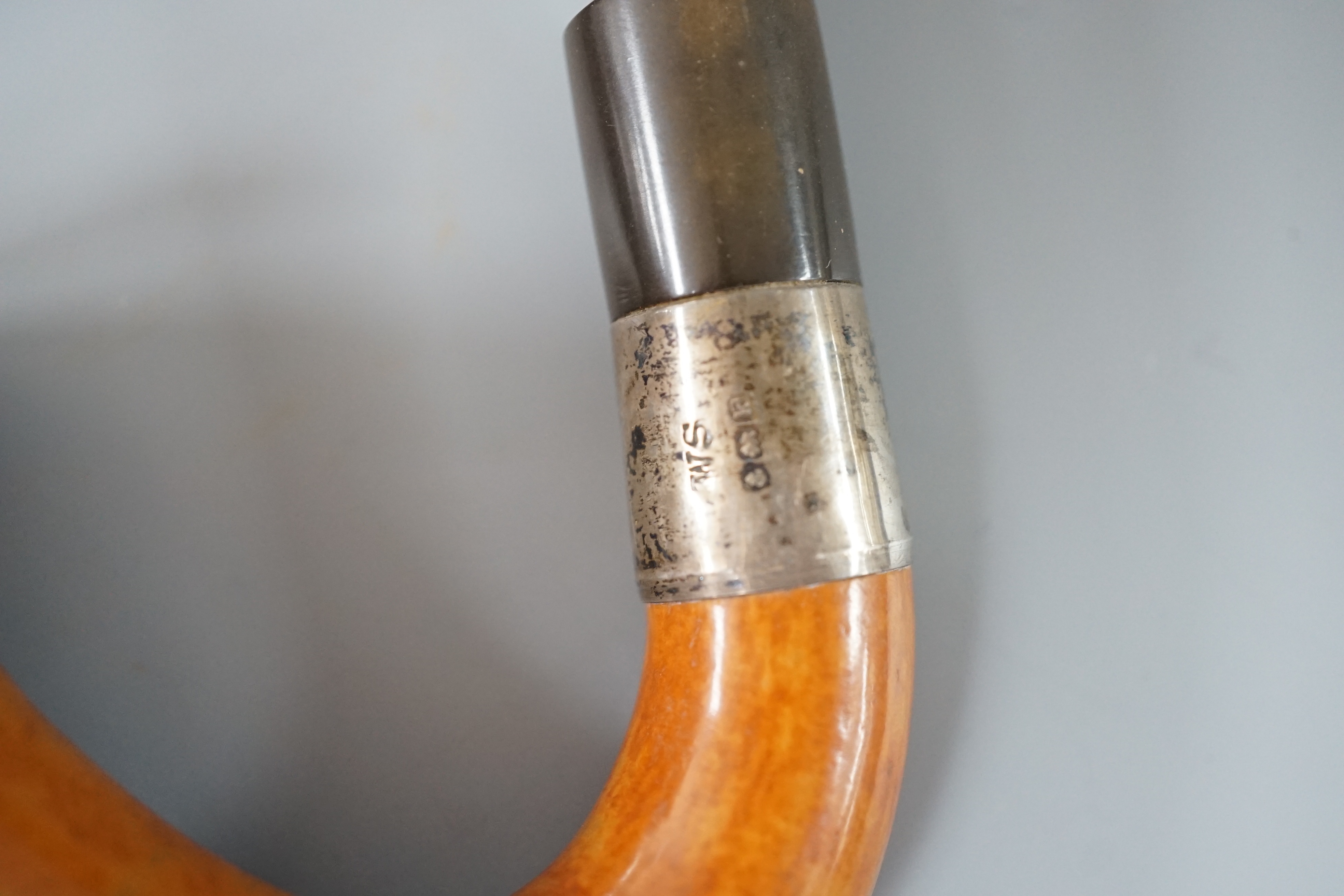 A cased Savel burr wood smokers pipe with silver collar, another pipe with silver collar and rim together with a novelty carved wood and horn ‘cow’ pipe